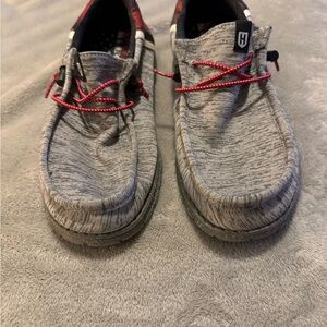 Stylish Gray Loafers with Red Accents